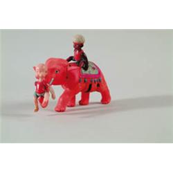 HENRY ON ELEPHANT W/UP TOY.