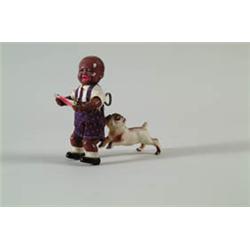 BLACK BOY "PETE" WITH SHAKING DOG. 