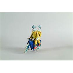 REPRO GERMAN CLOWNS ON CYCLE TOY.