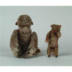 LOT OF 2 PLUSH OVER TIN W/UP ANIMALS.