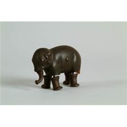 MINIATURE CAST IRON ELEPHANT.  