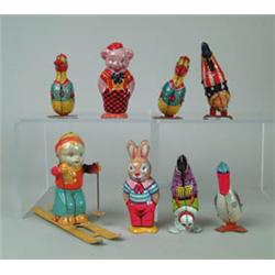 LOT OF 8 CHEIN W/UP TOYS.