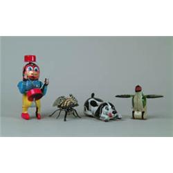 LOT OF FOUR JAPANESE TIN W/UP TOYS.