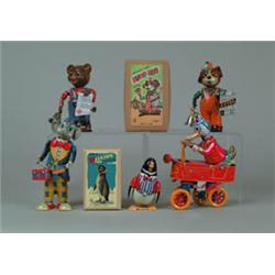 LOT OF 8 NEWER AND REPRO W/UP TOYS. 