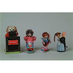 LOT OF FOUR JAPANESE TIN W/UP TOYS.