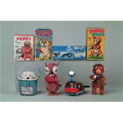 LOT OF EIGHT W/UP TOYS WITH ORIG. BOXES.