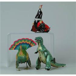 LOT OF THREE TIN W/UP TOYS.