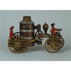 CAST IRON/TIN W/UP FIRE ENGINE.