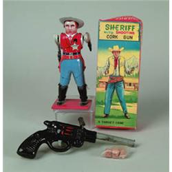 SHERIFF WITH SHOOTING GUN IN OB.