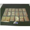 Image 2 : (18) 1957 Topps in protective sleeves.