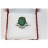 Image 1 : LADIES 14 KT. WHITE GOLD NATURAL EMERALD DRESS RING CLAW SET WITH 1 OVAL MIXED CUT