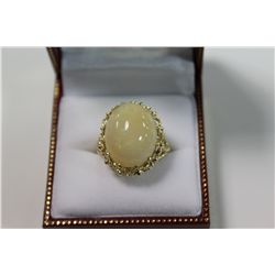 10KT. YELLOW GOLD NATURAL OPAL LADIES DRESS RING. MULTI-CLAW SET WITH