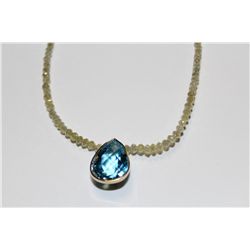 CHOKER LENGTH FACETED DIAMOND BEAD NECKLACE WITH A NATURAL BLUE TOPAZ PENDANT.  39CM  STAND OF