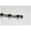 Image 2 : 925 STERLING SILVER RHODIUM FINISH BRACELET SET WITH 9 OVAL MIXED CUT NATURAL BLACK-GREEN SAPPHIRES