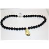 Image 1 : CHOKER LENGTH NECKLACE OF 40 ROUND FACETED BLACK ONYX BEADS.  STERLING SIVLER LOBSTER CLASP