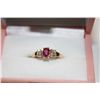 Image 1 : LADIES 18KT YELLOW GOLD NATURAL RUBY & DIAMOND SET DRESS  RING WITH 20 TAPERED BAQUETTE DIAMONDS