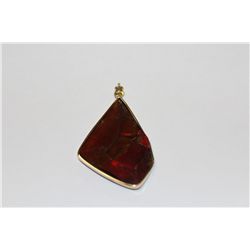 14 KT. YELLOW GOLD NATURAL AMMOLITE PENDANT BEZEL SET WITH A MODIFIED PEAR