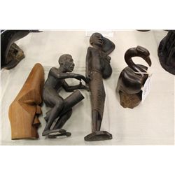 LOT OF THREE AFRICAN CARVINGS, TWO PEOPLE, ONE BIRD