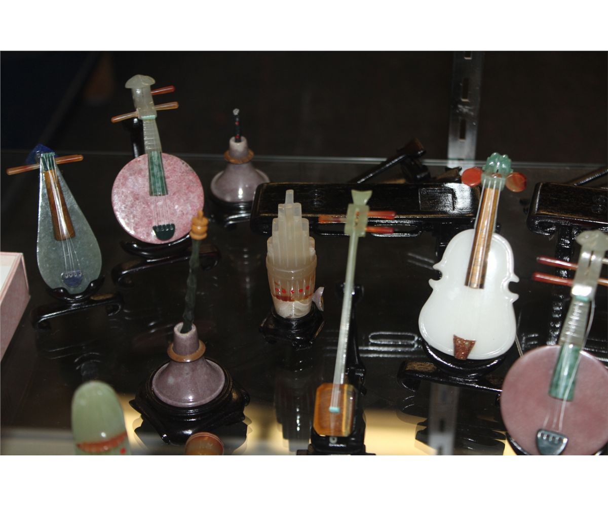 COLLECTION OF 17 MINIATURE CHINESE STONE INSTRUMENTS. A COMBINATION OF ...