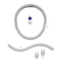 A PLATINUM AND DIAMOND NECKLACE...