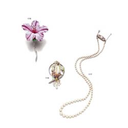 A SINGLE STRAND NATURAL PEARL NECKLACE...