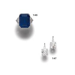 A PAIR OF DIAMOND EARPENDANTS...