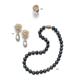 A PAIR OF SOUTH SEA CULTURED PEARL AND DIAMOND EARPENDANTS...