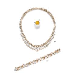 A COLORED DIAMOND AND DIAMOND NECKLACE...