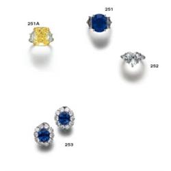 A SAPPHIRE AND DIAMOND RING...