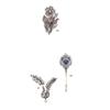 Image 1 : AN ANTIQUE ENAMEL, RUBY AND SAPPHIRE JABOT PIN...