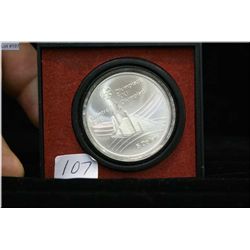 1976 five dollar Olympic silver coin