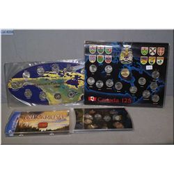 Three cased Canadian coin collector's sets including 2003 "Oh, Canada!" un-circulated coin set, 2000