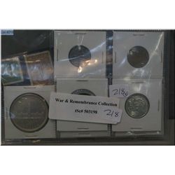 A selection of Canadian War Remembrance coins and stamps including 1939 silver dollar, loonies, nick