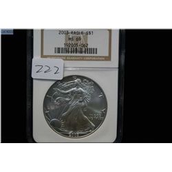 A graded 2003 Eagle 1 oz. sterling silver American one dollar coin