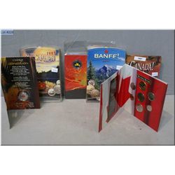 Five sets of cased Canadian collectors coins including 2001 quarter,  2000 Banff and 1999 "Oh, Canad