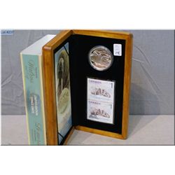 Wooden boxed 2005 Canadian Walrus and Calf 99.99% fine silver $5 coin and stamp set
