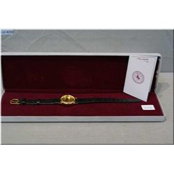 A box Gold Medallion gold plated Le Petit Clock wrist watch