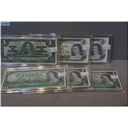Six Canadian $1 bills including 1937, 1954, 1967 and 1967 double date and 1973 consecutive serial nu