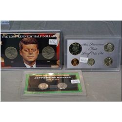 Three sets of cased American collector's coins including 2002-2003 The Lost Kennedy half dollars, Sa