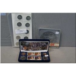 Three sets of Canadian collector's coin sets including 1953-2020 Queen Elizabeth II coin and stamp b