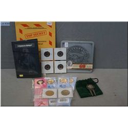 Selection of Canadian coin collectibles including 2006 loonie bookmarks, poppy quarters, breast canc