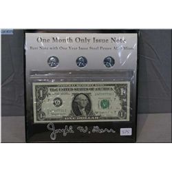 An American green seal one dollar bill and three one year issue steel pennies