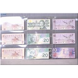 Fifteen Canadian bank notes including six 1986 two dollar bills, two 1989 ten dollar bills, one 2001