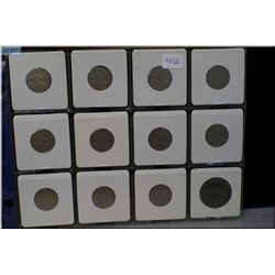 Twelve Canadian coins including 1920's -30's nickels and an 1859 large penny