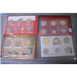 Four Canadian un-circulated coins sets including 2011, 2012, 2013 and 2014