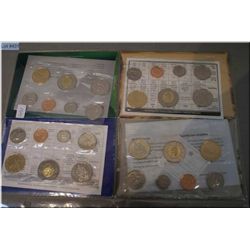 Four Canadian un-circulated coins sets including two 2000s, 2001 and 2002