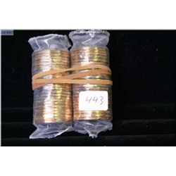 Two rolls of 2010 Navy and Marine loonies