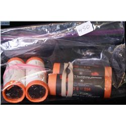 Four rolls of Canadian quarters including two "Lest We Forget" and two Vancouver Olympics