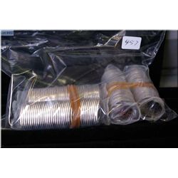 Four rolls of Canadian quarters including two 2010 with double red poppies and two Women's Hockey ro