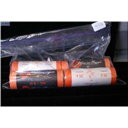 Four rolls of Canadian quarters including two Olympic and two "Lest We Forget"